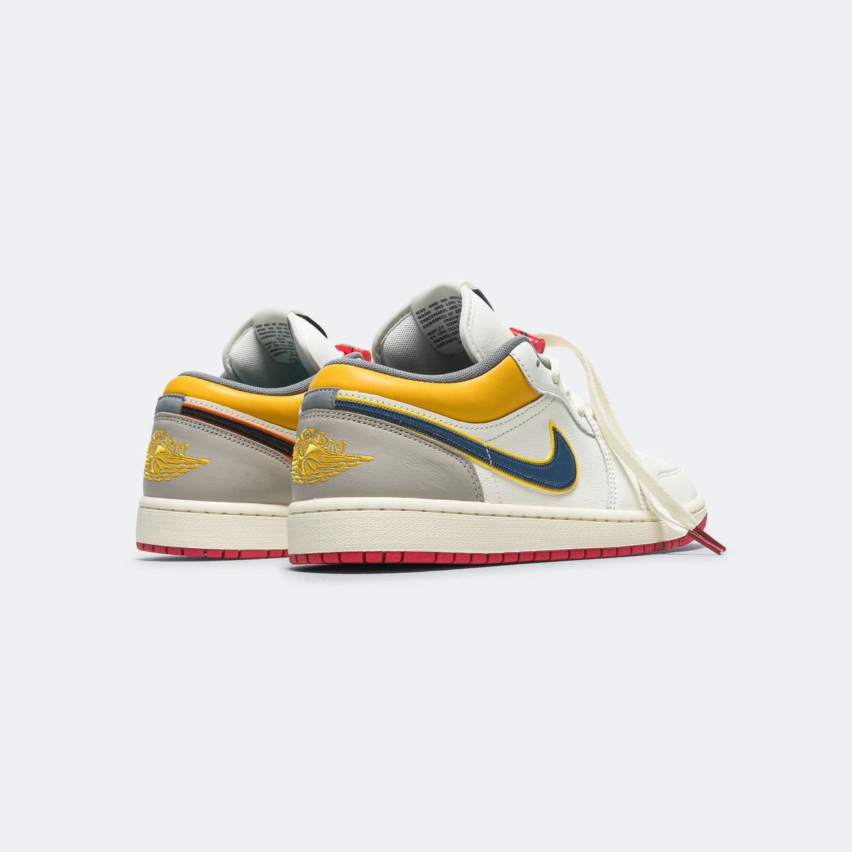 Air Jordan 1 Retro Low PRM - Sail/Brave Blue-Cashmere | UP THERE