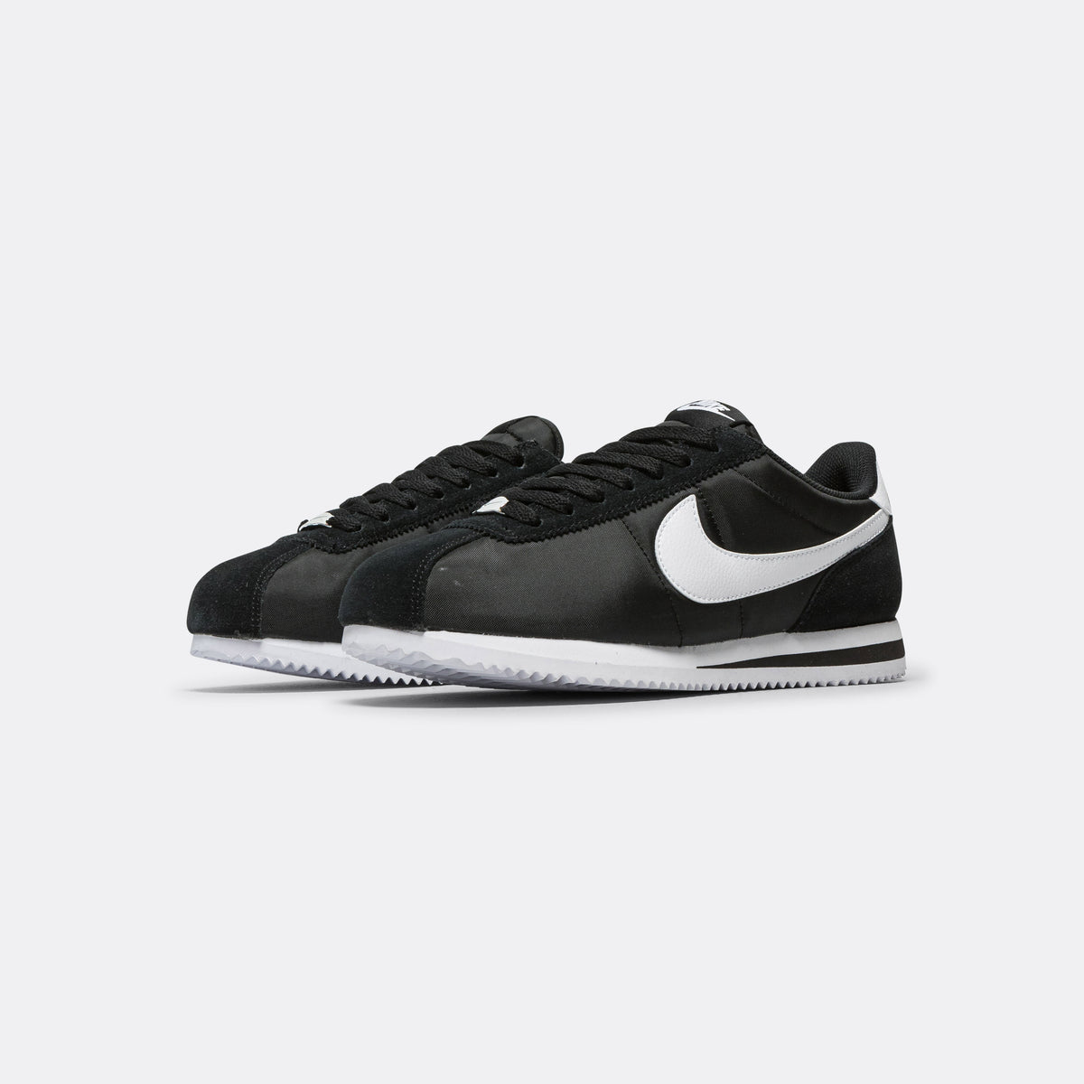 women's nike cortez black white