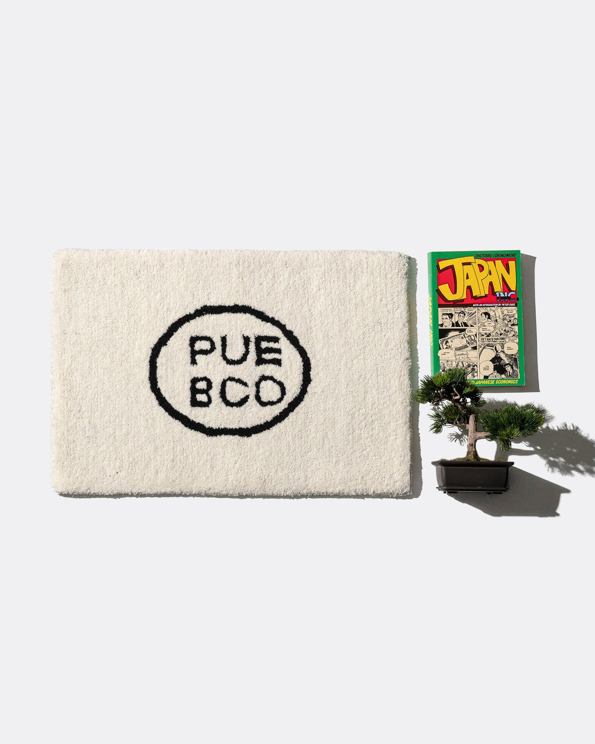 PUEBCO - Tufted Mat - Puebco Logo - UP THERE
