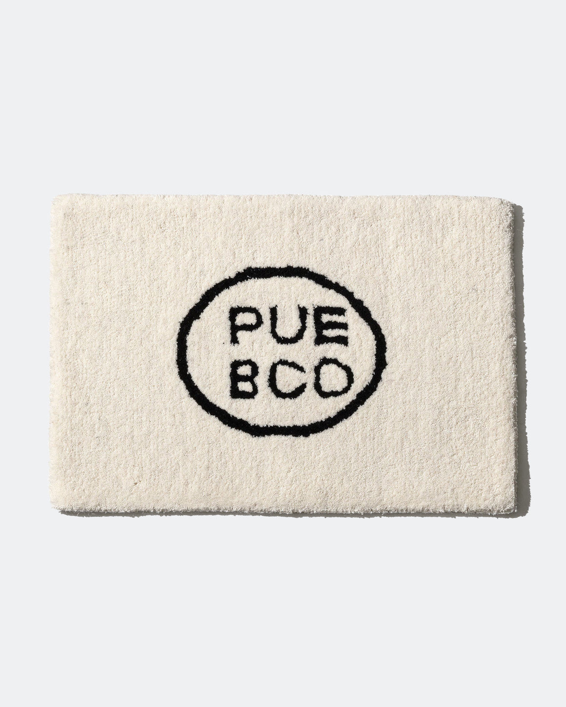 PUEBCO - Tufted Mat - Puebco Logo - UP THERE