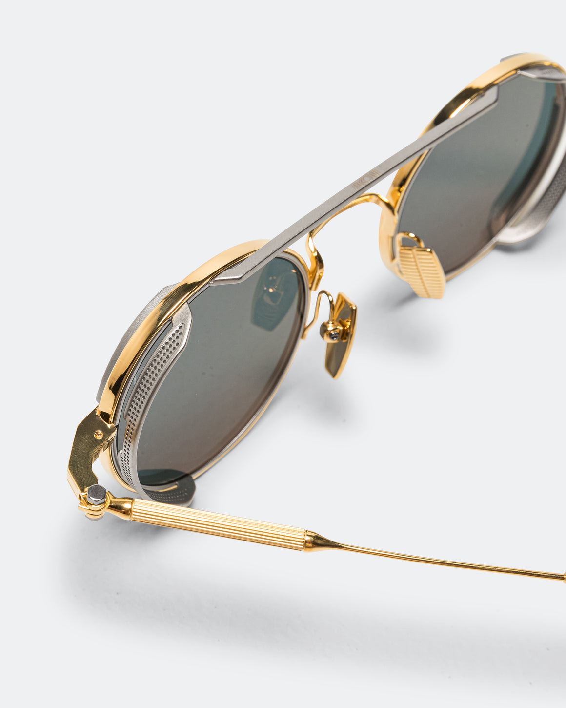 Akoni - Eris Gold Series - 2 Micron 18k Gold - Antiqued Silver - Deep Emerald Green lenses - UP THERE