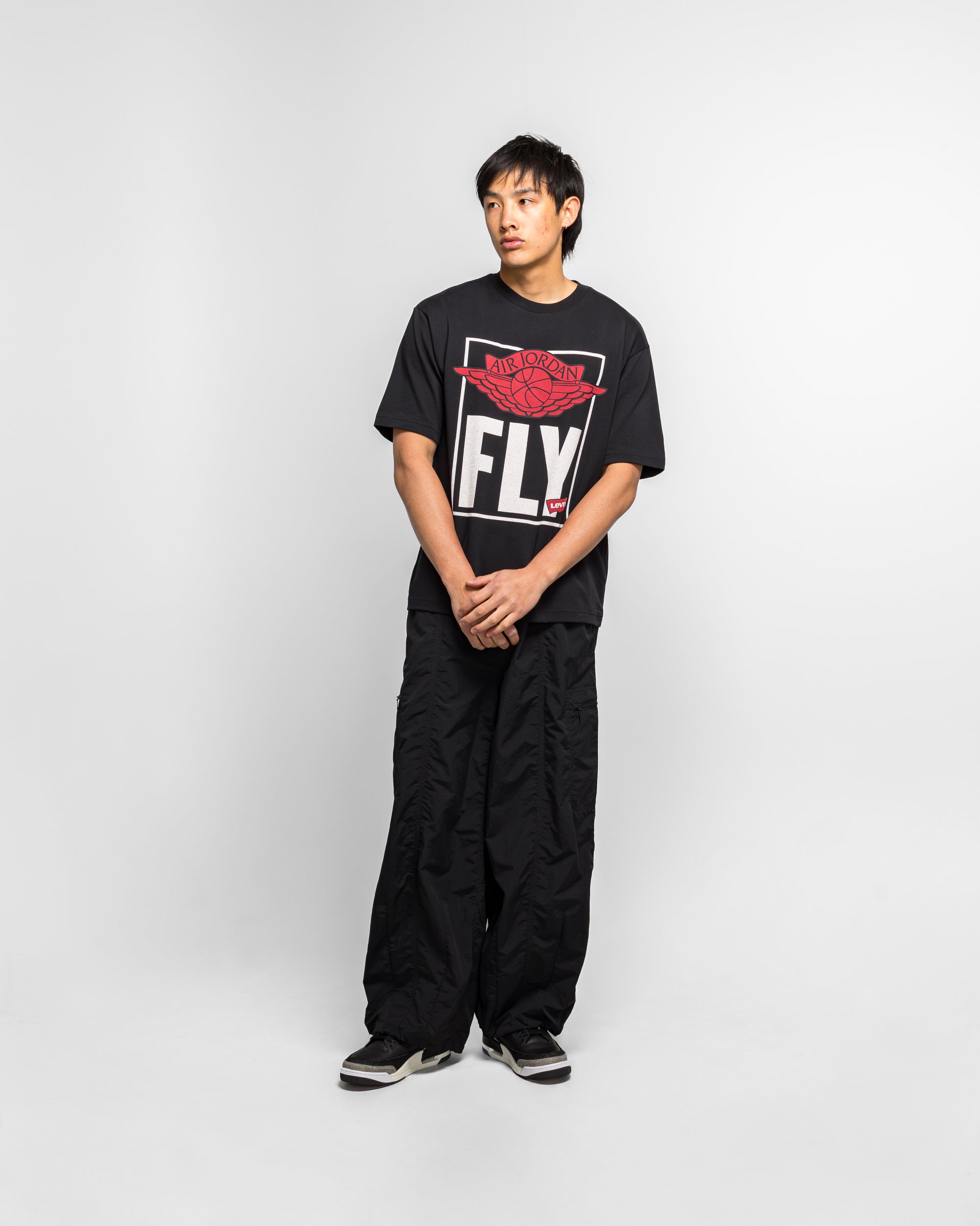 Jordan - SS Tee x Levis - Black | UP THERE