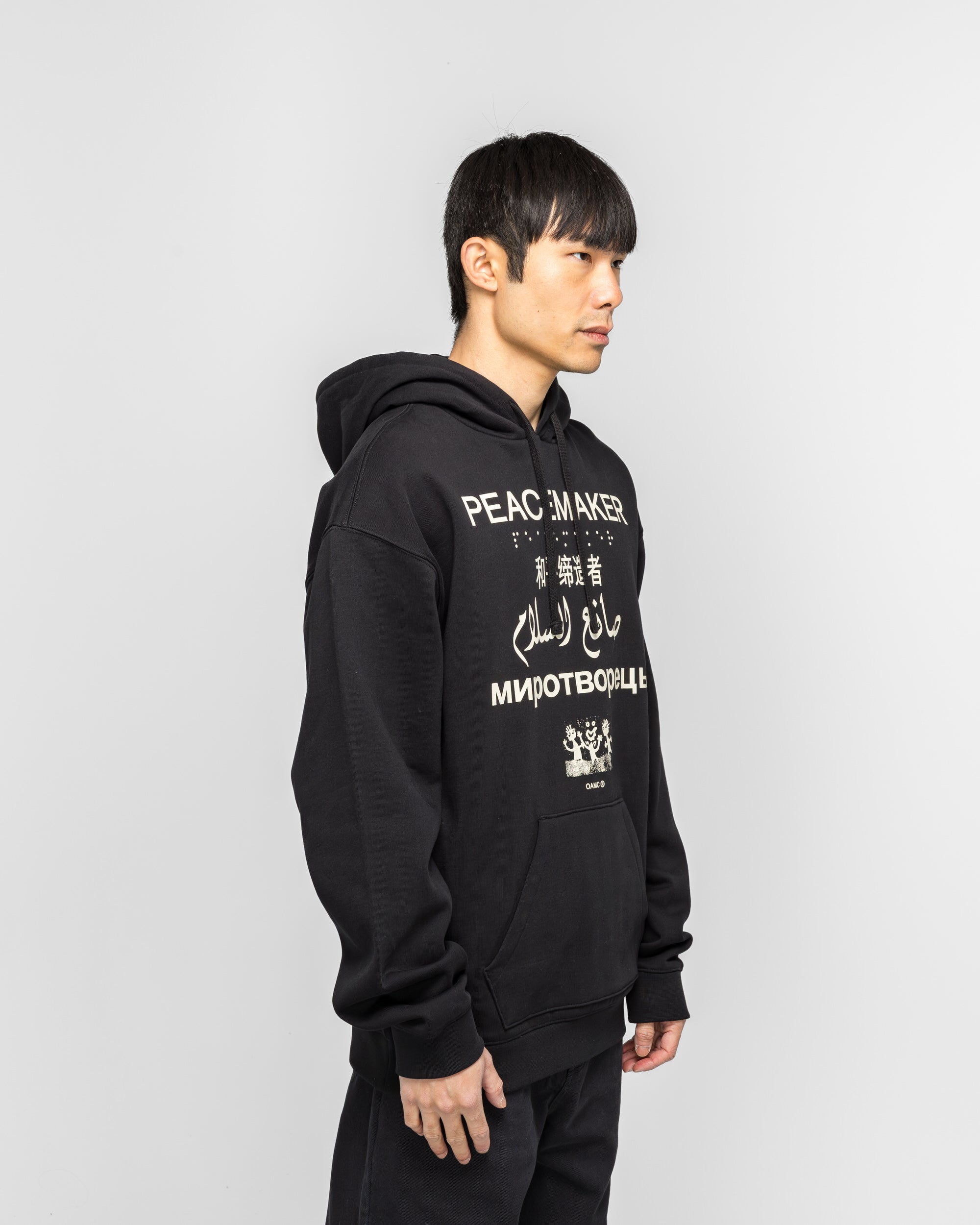 OAMC Peacemaker - Loose Fit Hoodie Languages Print - Black | UP THERE