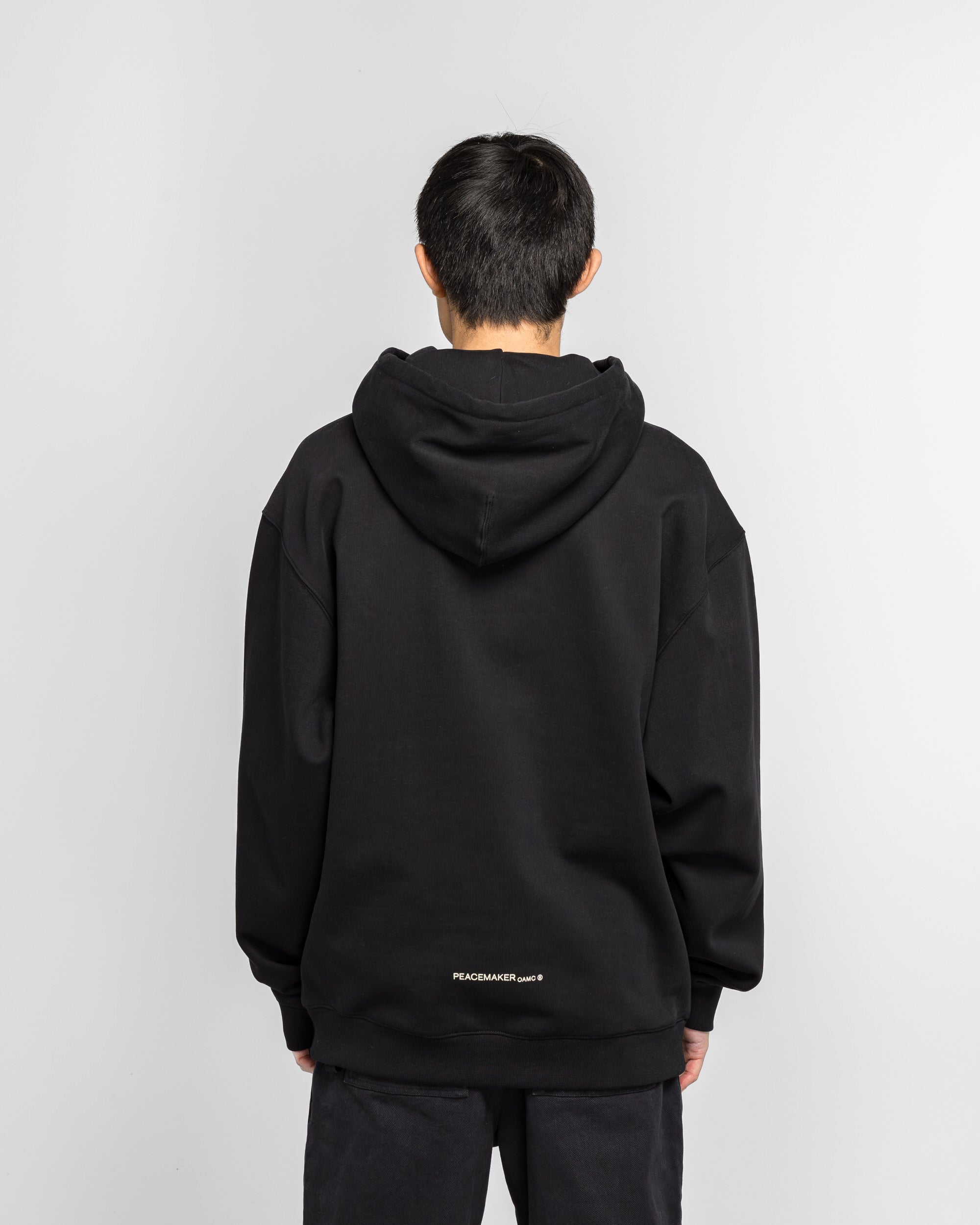 OAMC Peacemaker - Loose Fit Hoodie Languages Print - Black | UP THERE