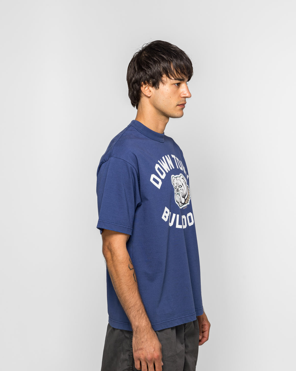 Unlikely - Authentic Graphic Tee BULLDOGS - Blue - UP THERE