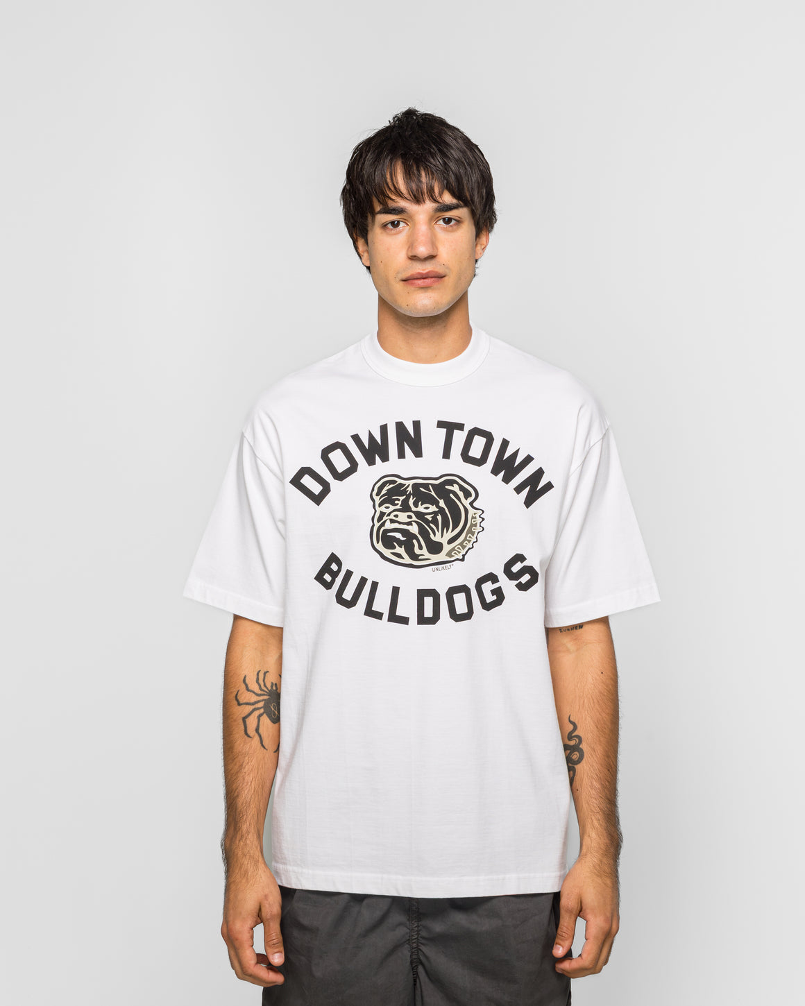 Unlikely - Authentic Graphic Tee BULLDOGS - White - UP THERE
